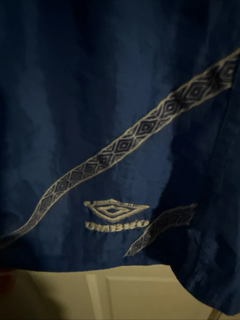 Umbro Men's Blue Athletic Shorts with Reflective Trim